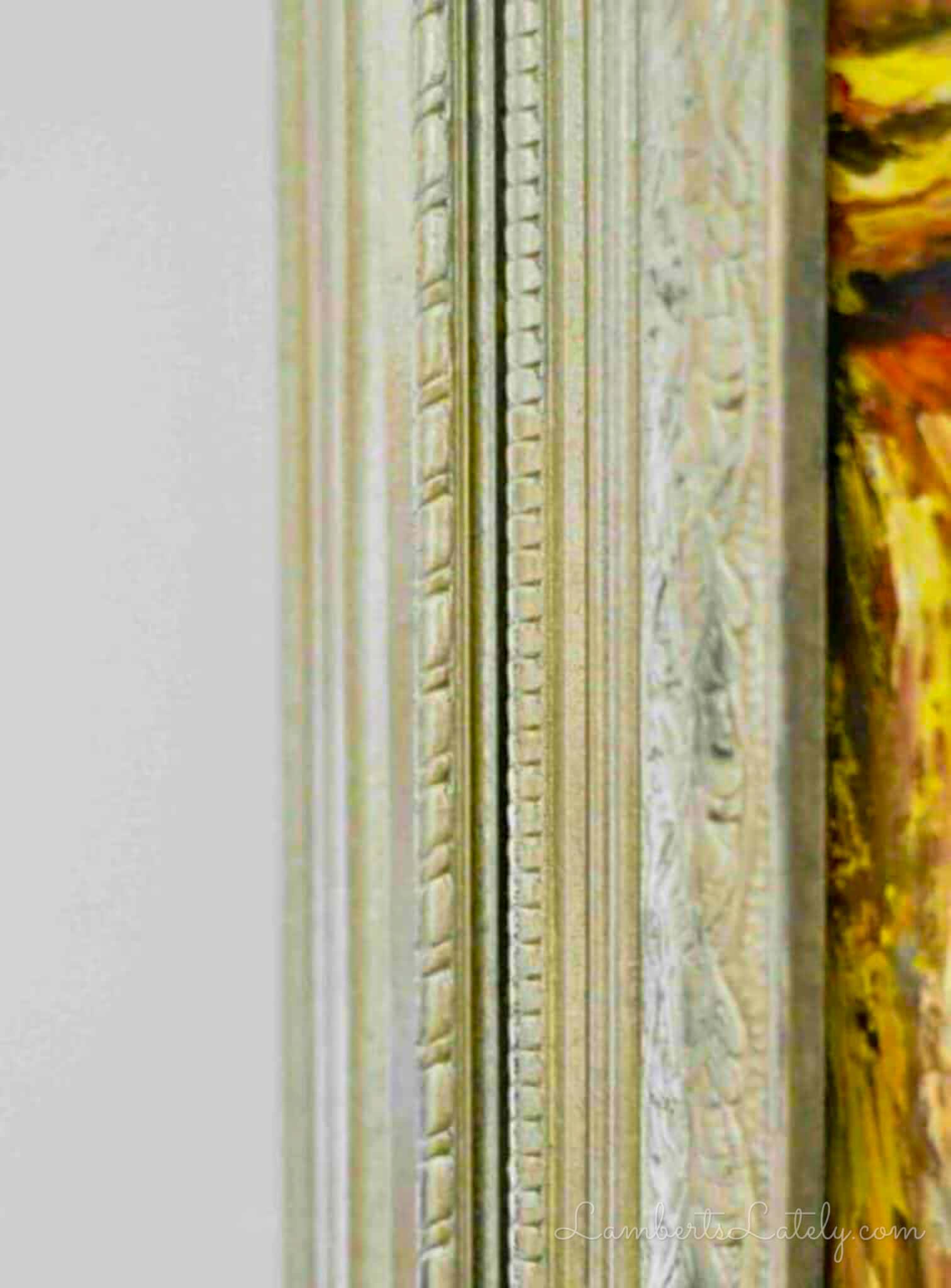 gold edge of a picture frame.