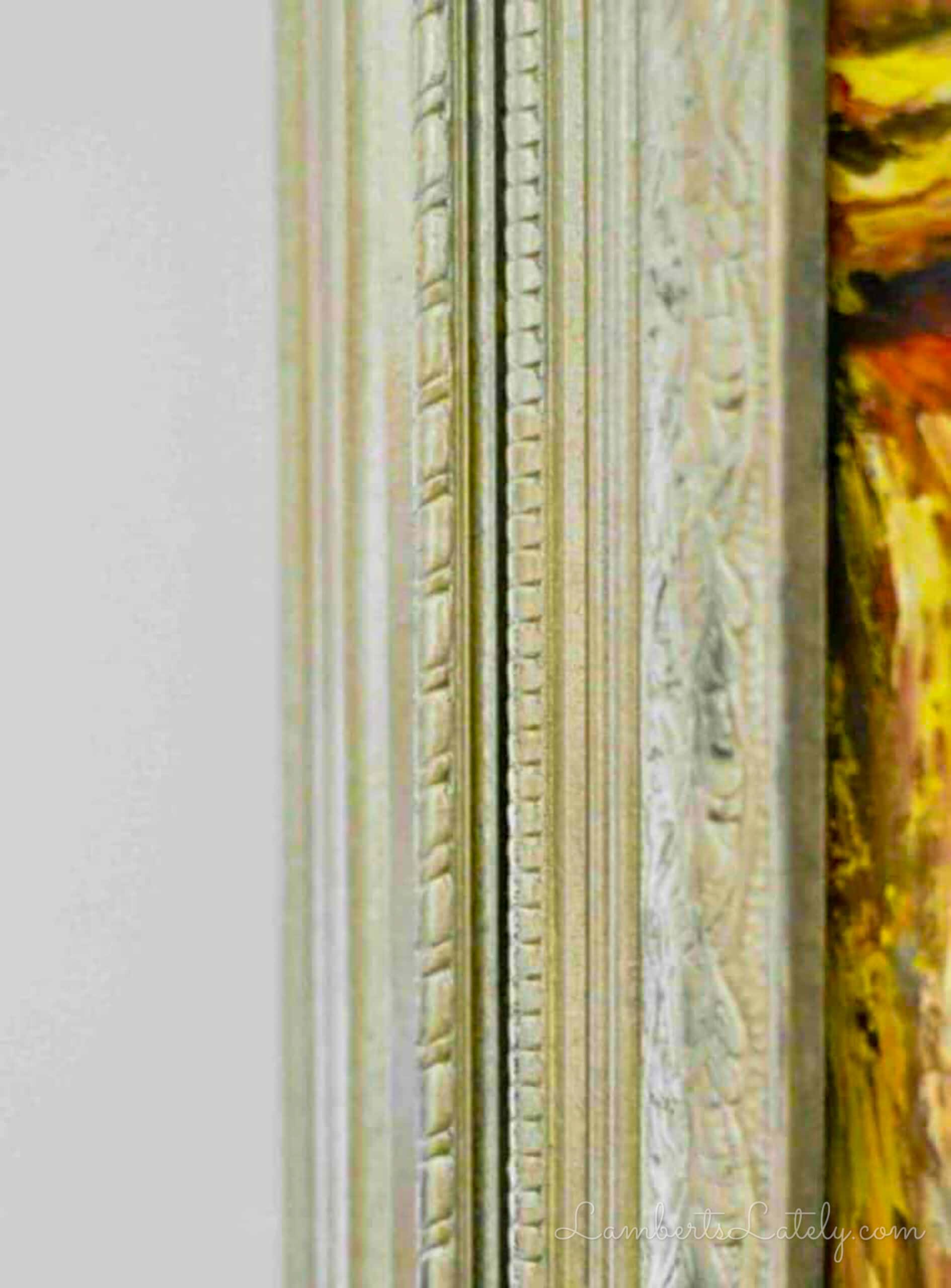 gold edge of a picture frame.