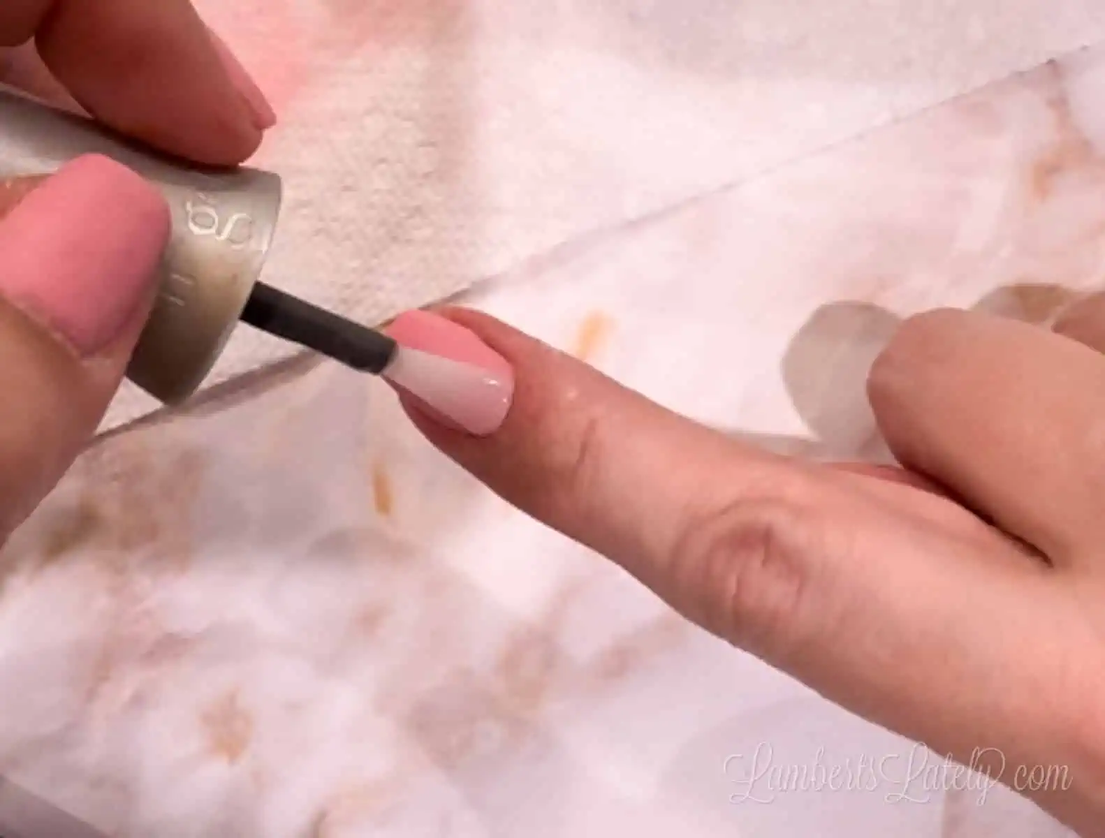 apply top coat to nails.