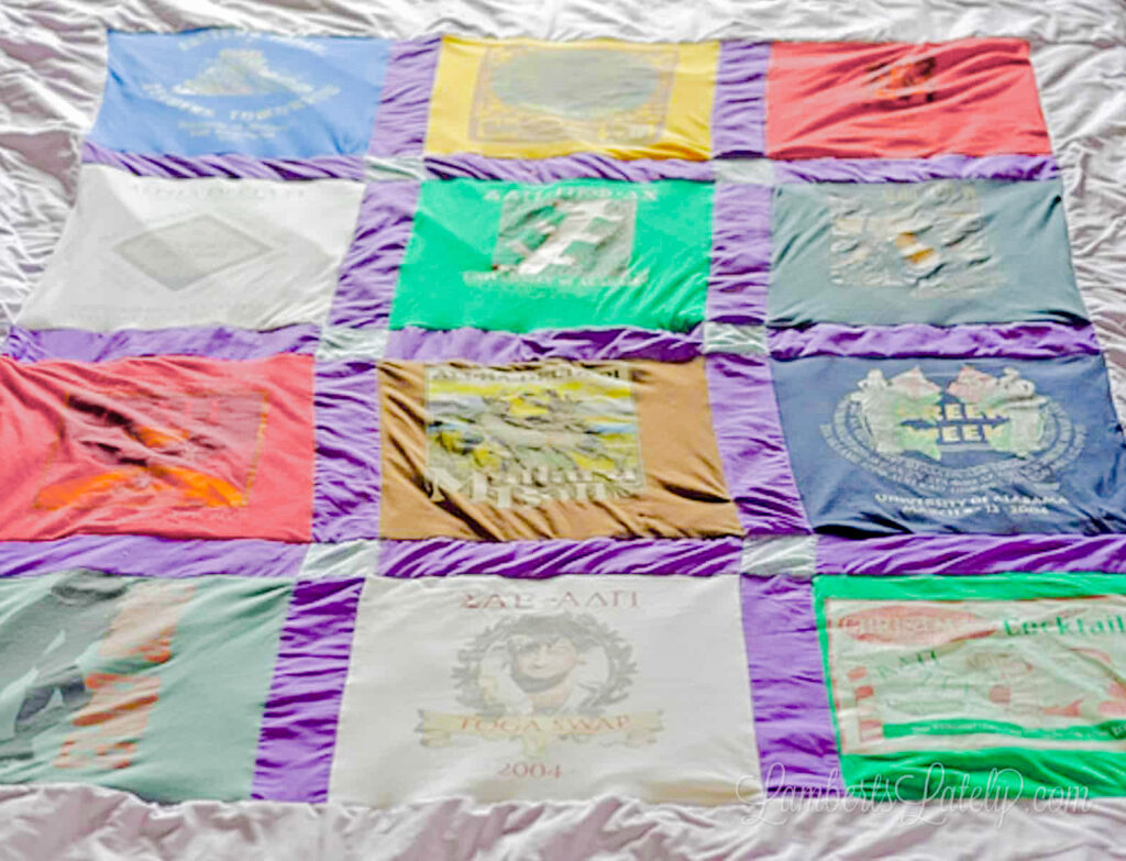 t-shirt quilt laying on a floor.
