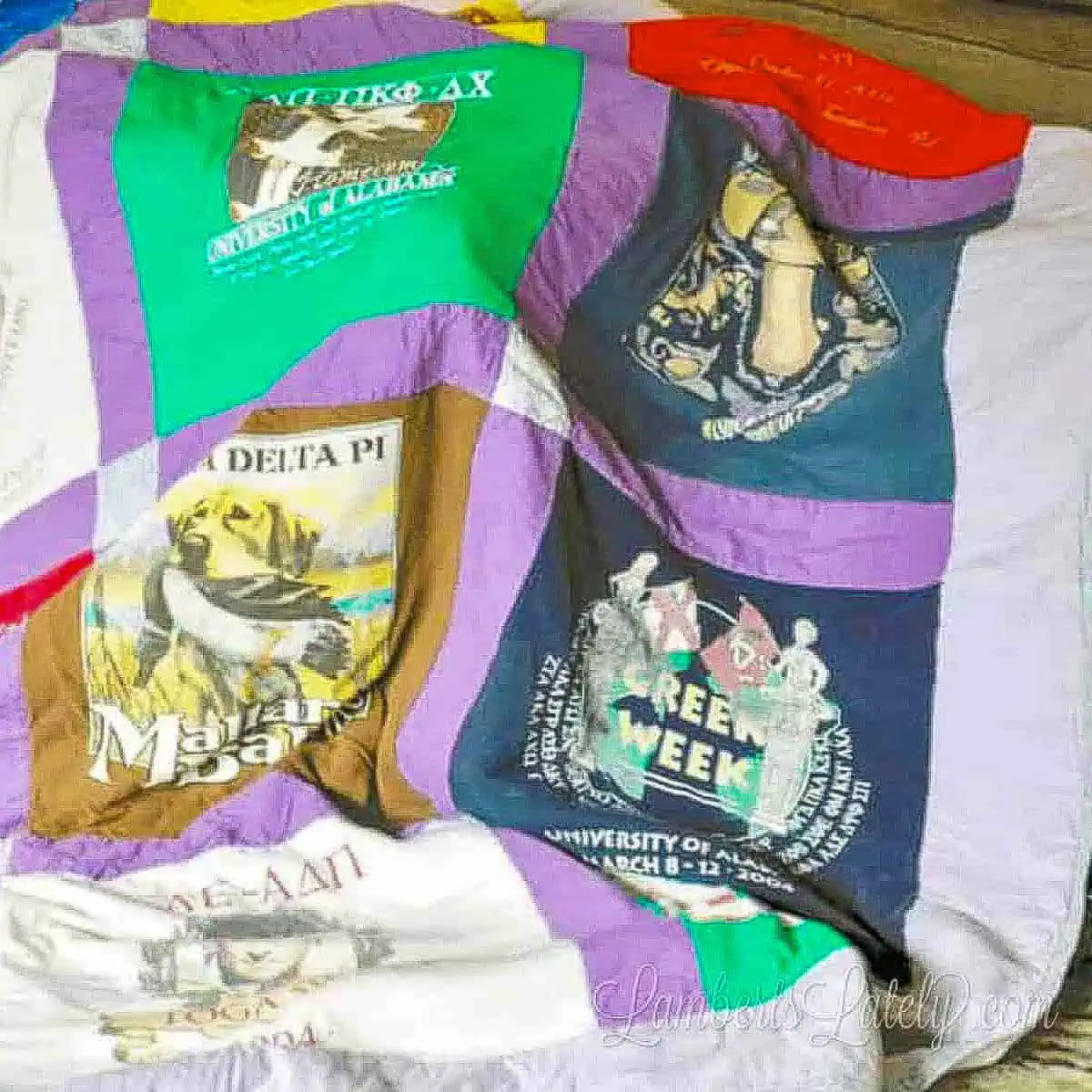 close up of t-shirt quilt draped on a table.