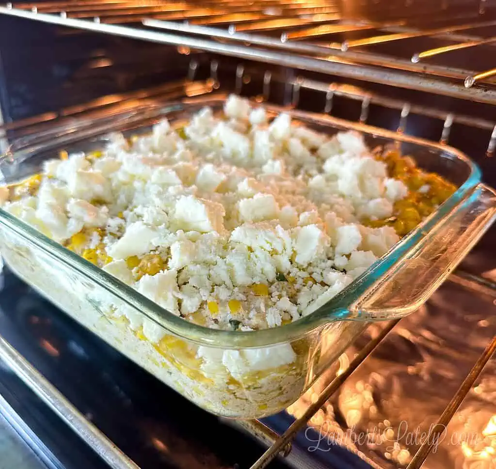 sprinkled cheese on top of corn casserole.