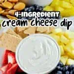 Cream cheese dip with strawberries, blueberries, and crackers on a platter.