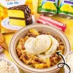 Delicious pineapple dump cake with vanilla ice cream and ingredients on a table.