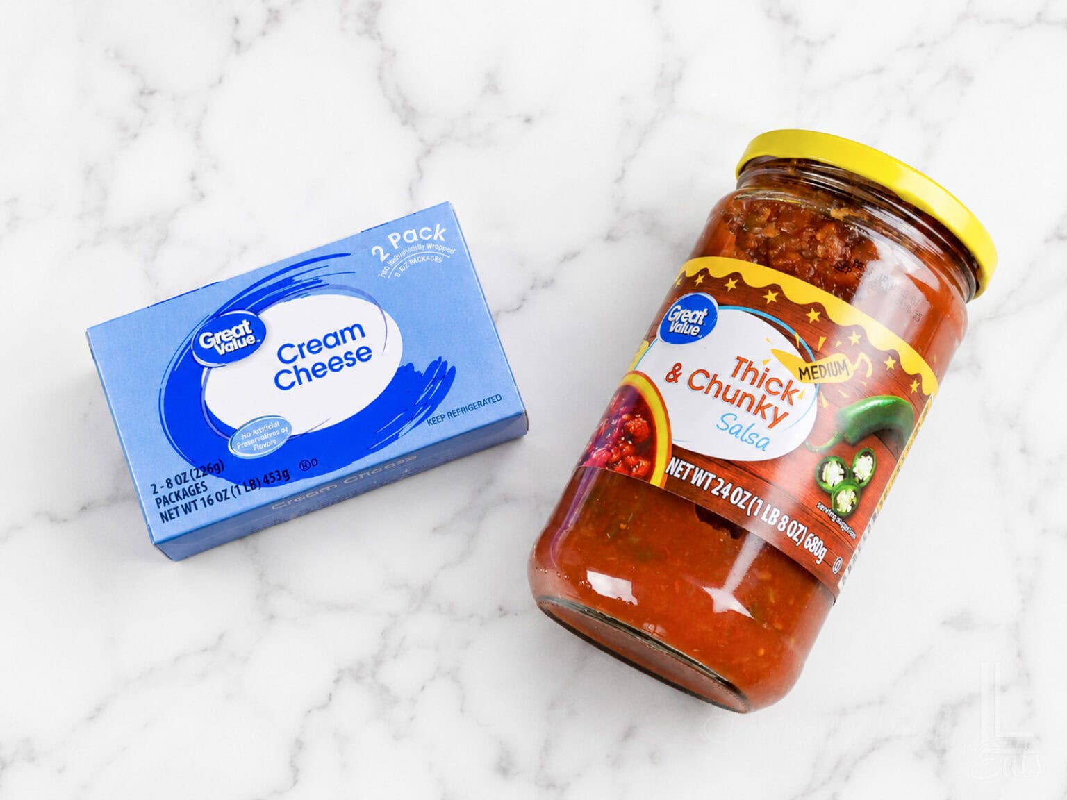 2 ingredients for cream cheese salsa dip: full fat block cream cheese and jarred medium salsa.