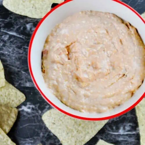 cream cheese and salsa dip with chips.