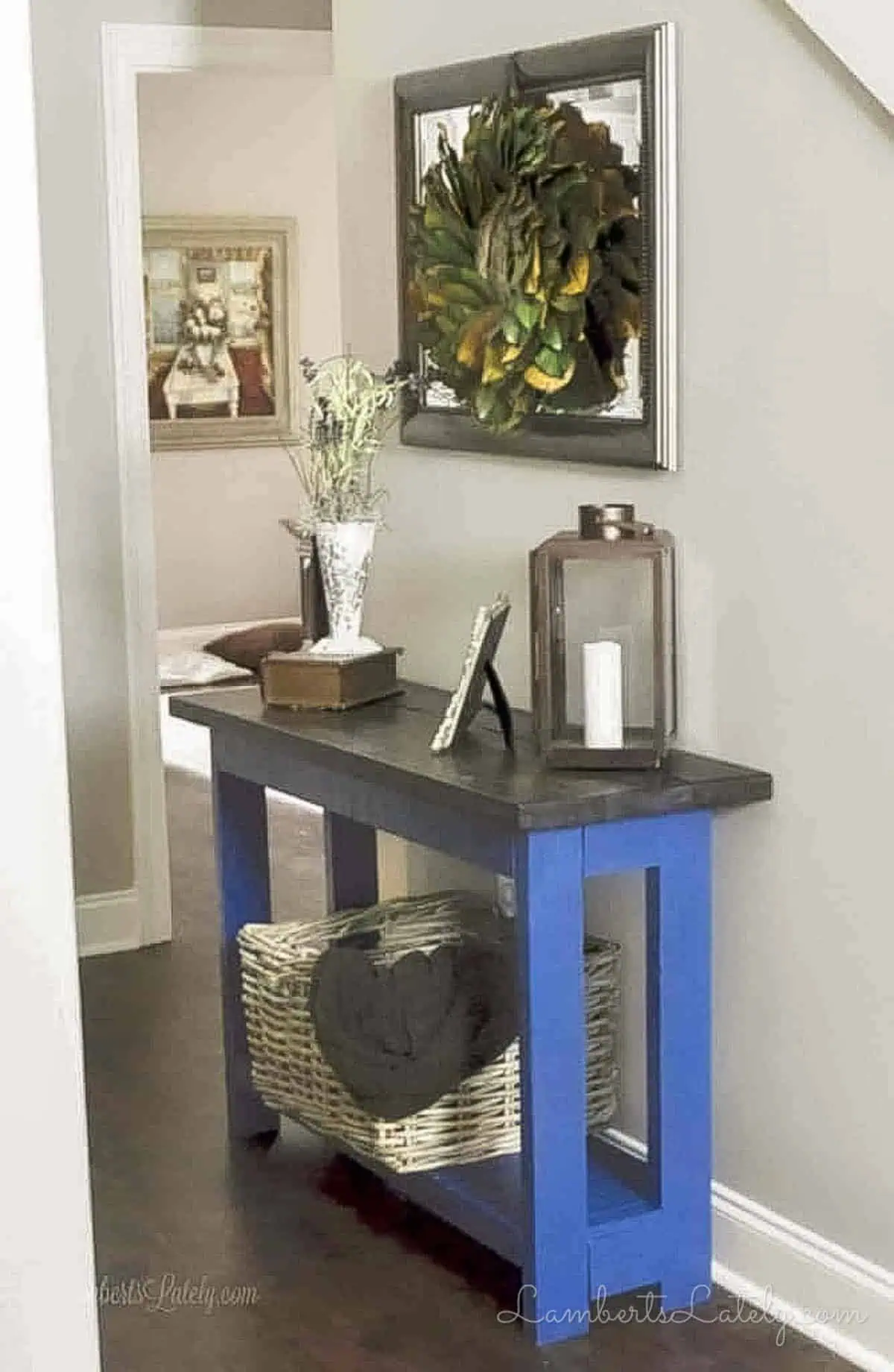 console table, decorated in an entryway.