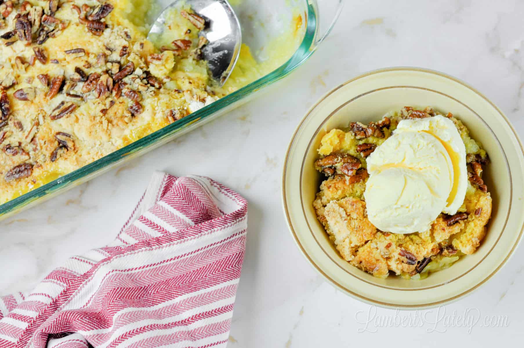 baking dish and bowl of pineapple dump cake.