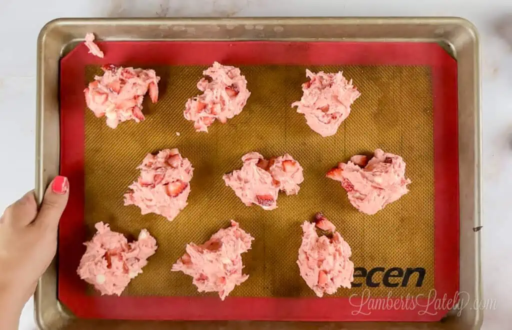 strawberry cookie dough on a baking pan.