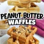 Stacked peanut butter waffles topped with chopped nuts and syrup on a white plate.