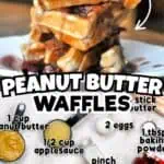 Peanut butter waffles with jelly syrup and fresh ingredients on a wooden surface.