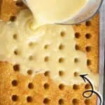 Close-up of banana pudding poke cake with pudding being poured on top.