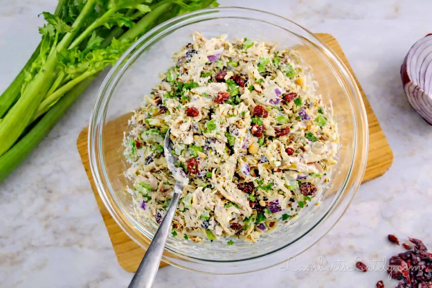 mixed cranberry chicken salad in a bowl.