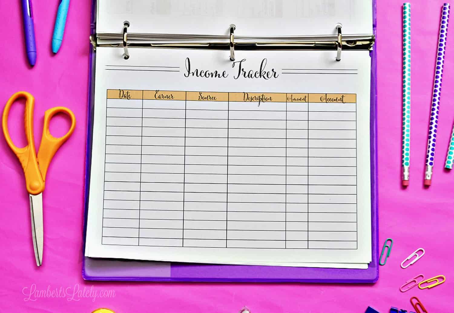 income tracker in a binder.