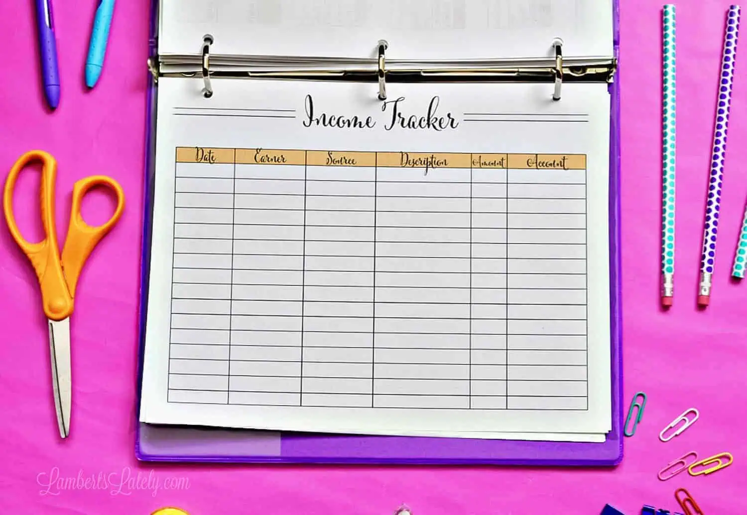 income tracker in a binder.