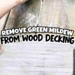 Person cleaning green mildew from wooden deck with scrub brush and water.