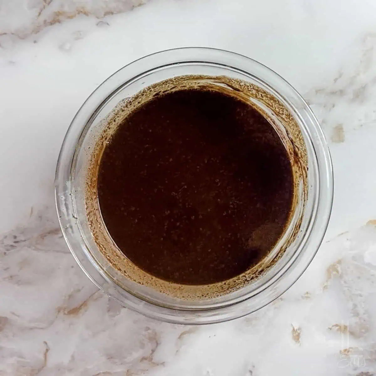 showing the milk/chocolate mixture after microwaving, melted.