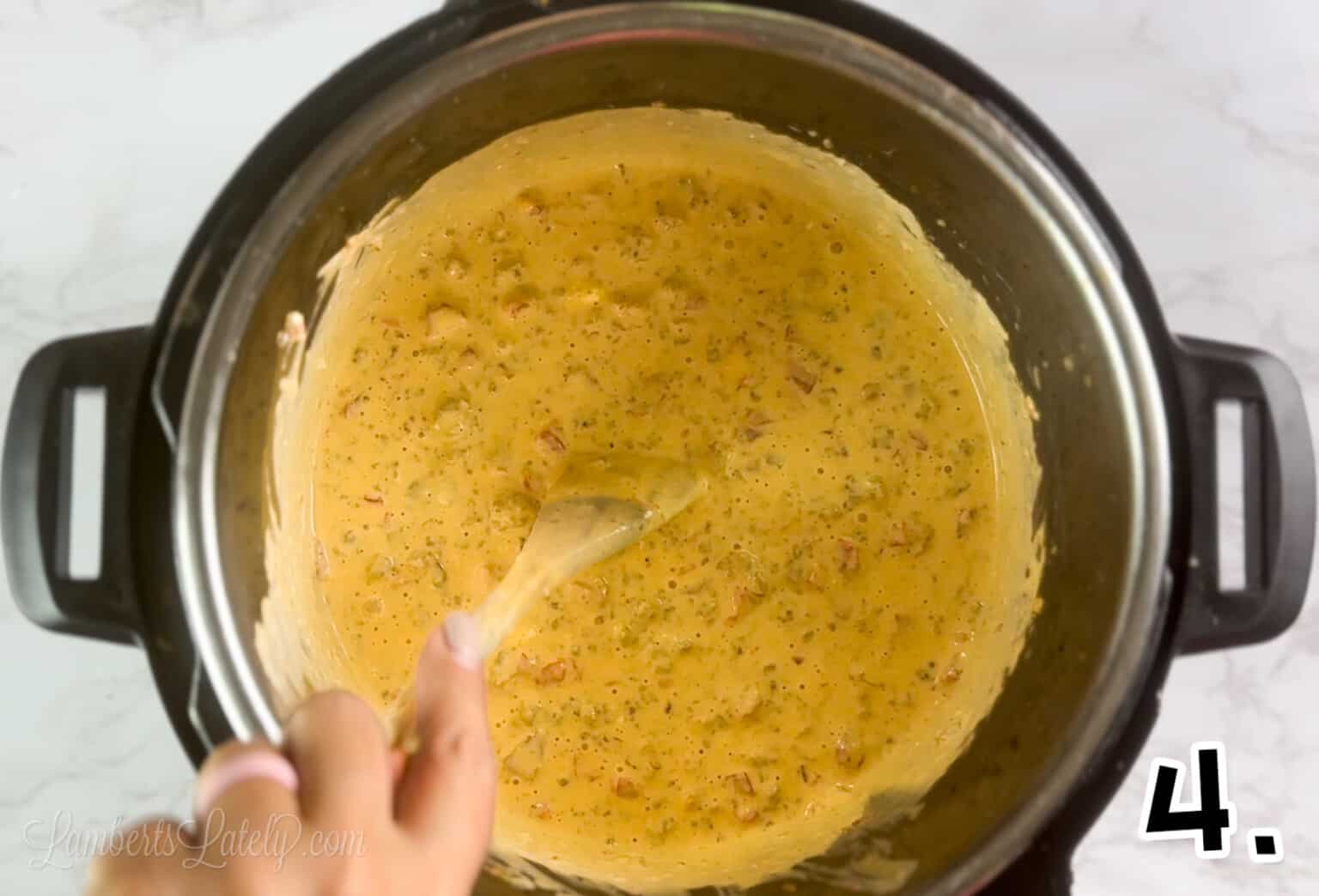 stirring rotel dip in an instant pot.