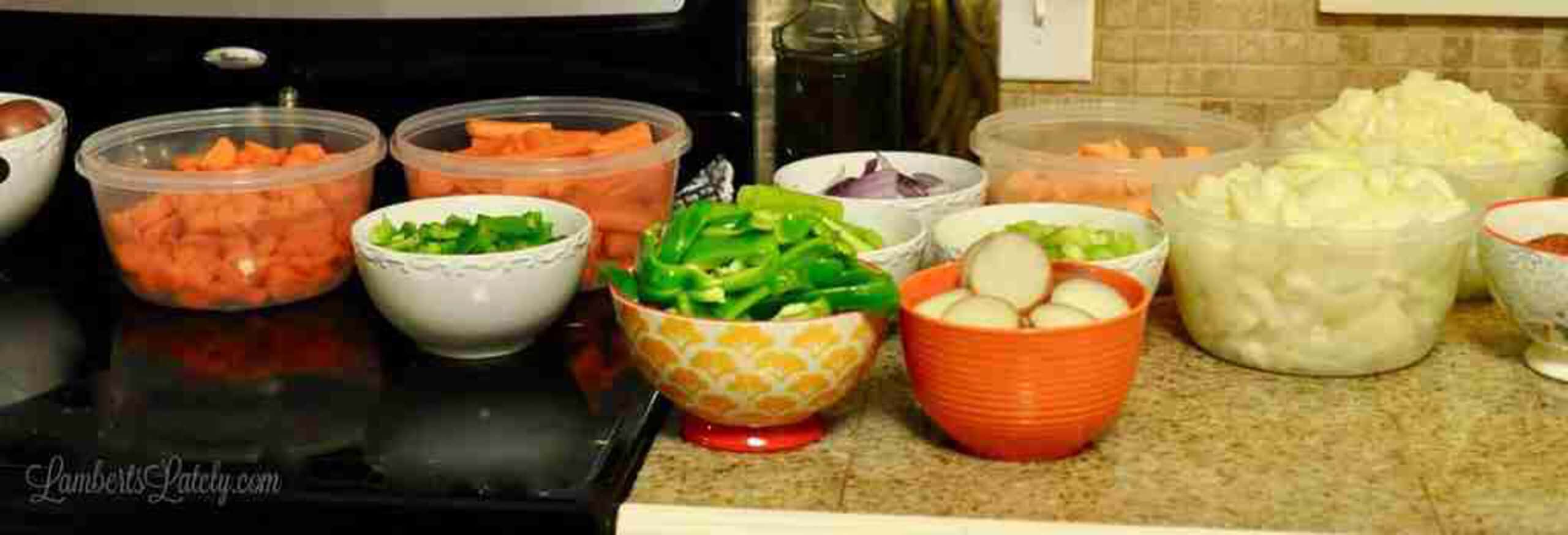 vegetables set up buffet style on a counter.