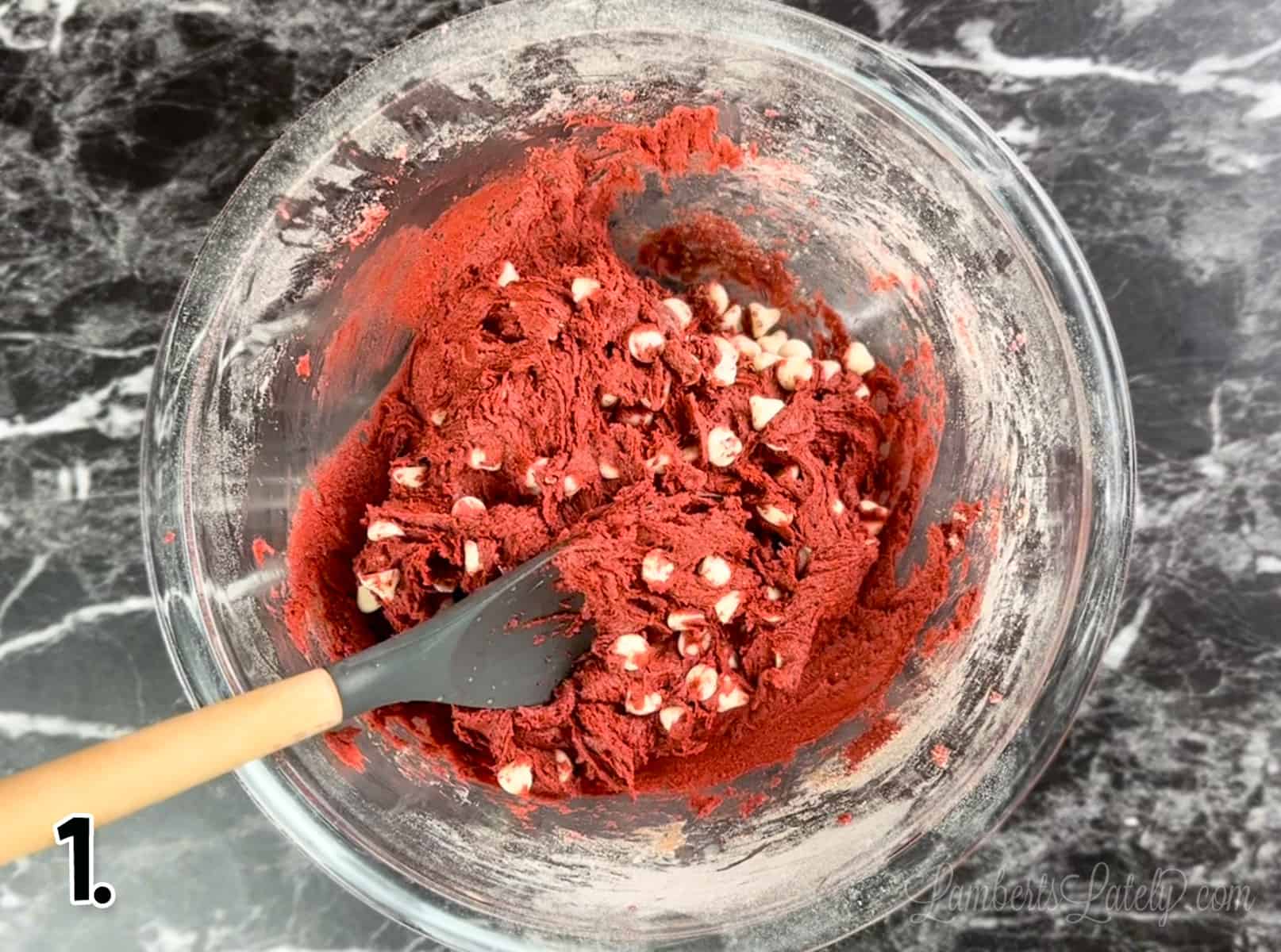 red velvet cookie dough in a glass bowl.