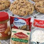 Loaded cookie butter cookies with walnuts, chocolate, and cookie butter on cooling rack.