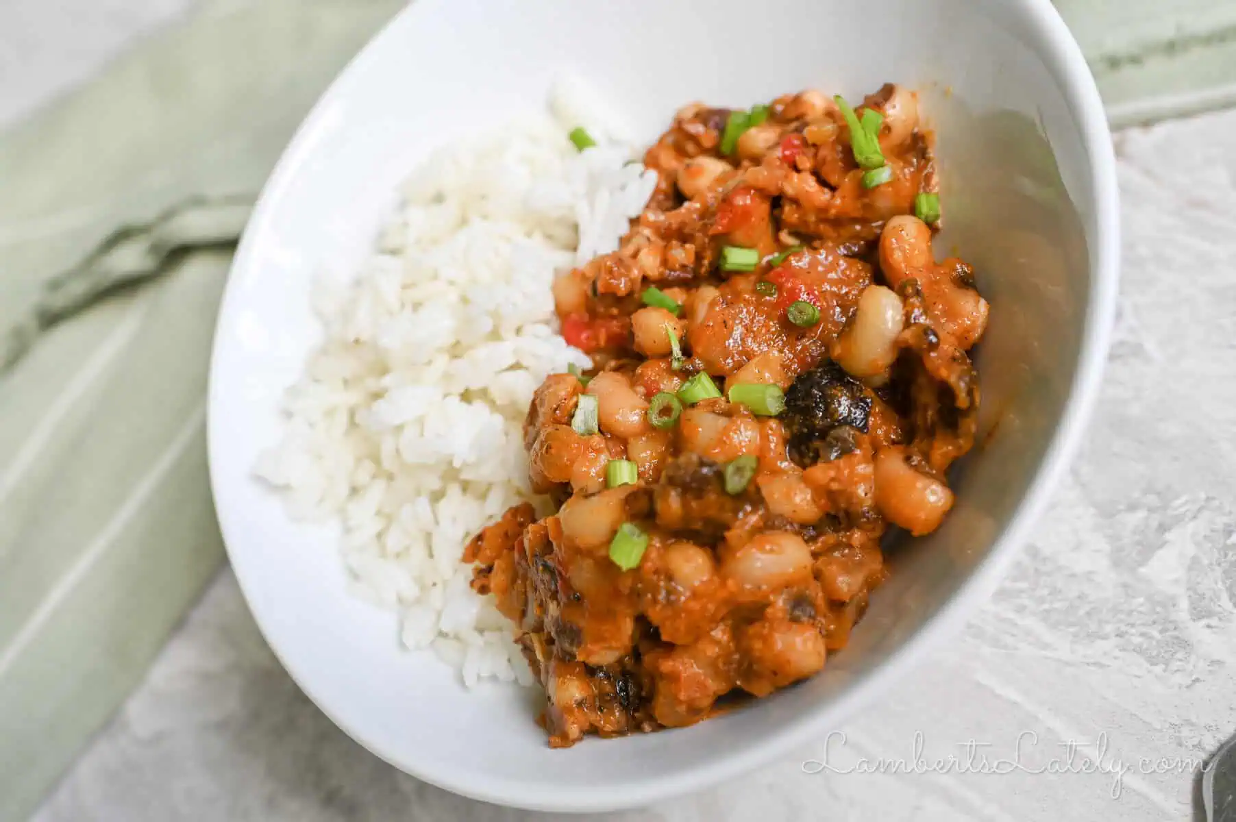 instant pot hoppin' john and white rice in a bowl.