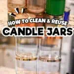 Stacked candle jars with colorful lids on a wooden surface for storage and reuse.