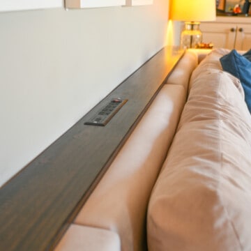 a diy sofa table behind the couch.