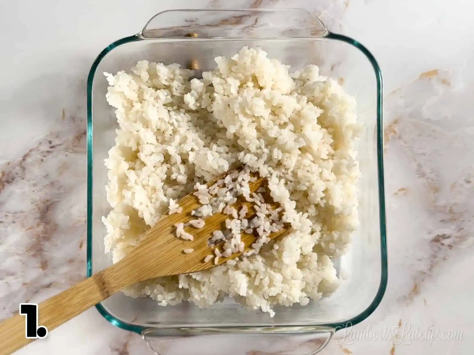 sushi rice in a casserole dish.