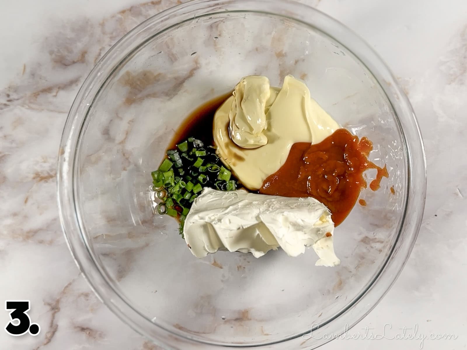 ingredients for spicy salmon sushi bake in a bowl before mixing.