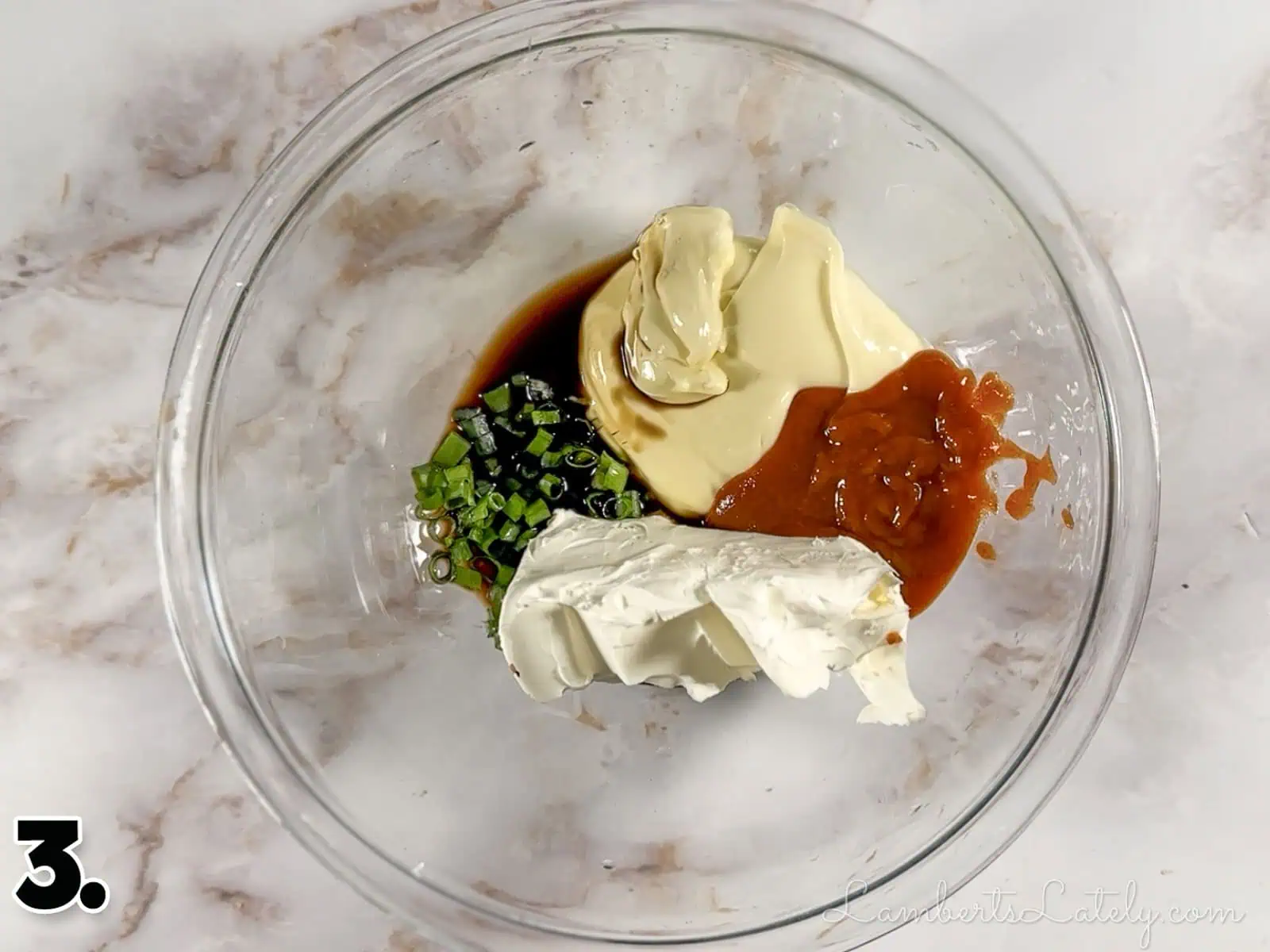 ingredients for spicy salmon sushi bake in a bowl before mixing.