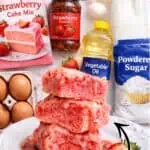Delicious homemade strawberry brownies with fresh strawberries and cake mix ingredients.