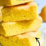 Stack of lemon bars with sweet lemon glaze, close-up shot for Lemon Brownies recipe.