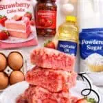Homemade strawberry brownie bars made with boxed cake mix and fresh strawberries.