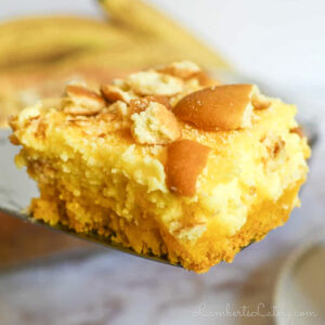 holding a banana pudding brownie on a serving utensil.