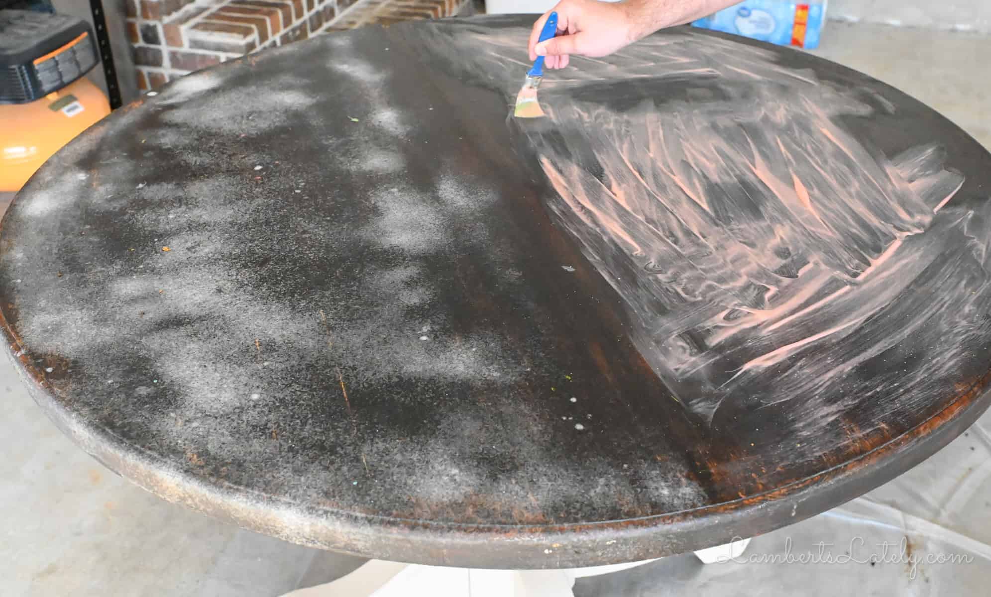 oven cleaner on one half of a stained wood table, Citristrip stripping gel on the other half.