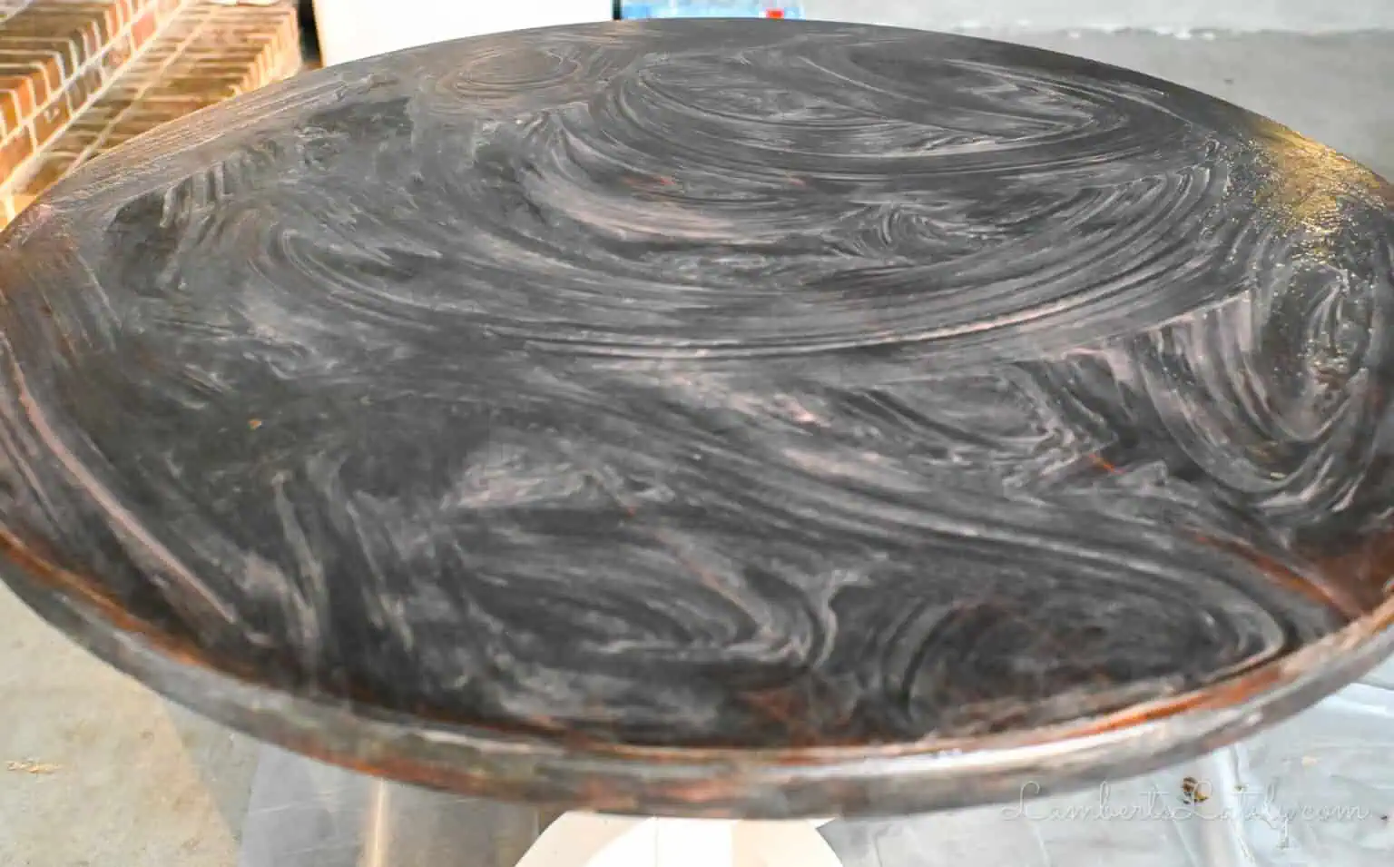 wood table coated in a thick coat of citristrip.
