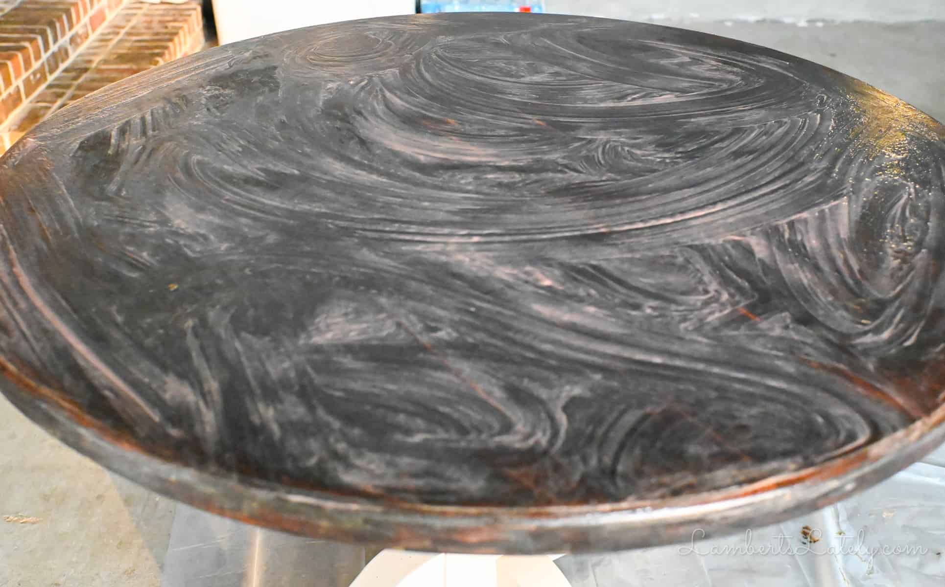 wood table coated in a thick coat of citristrip.