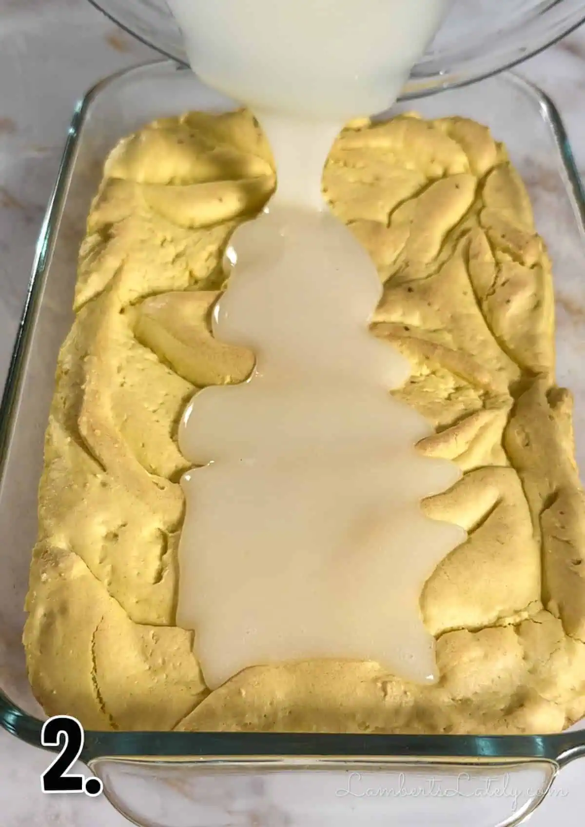 drizzling baked brownies with lemon glaze.