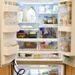 Organized refrigerator with labeled zones for easy access and storage.