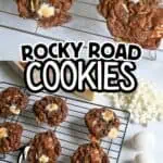 Delicious Rocky Road Cookies with marshmallows and chocolate chunks on cooling rack.