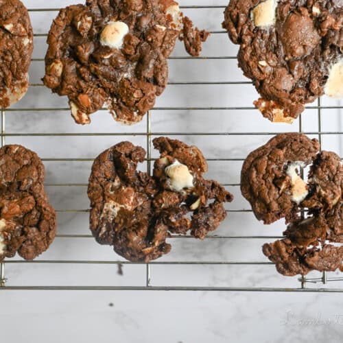 rocky road cookies on a baking rack.