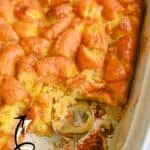Delicious Krispy Kreme bread pudding with caramelized topping and leftover donuts.