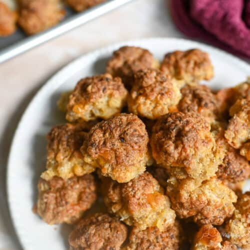 cooked sausage balls on a plate.