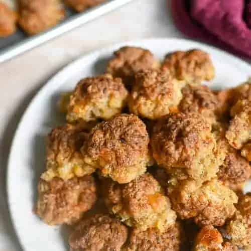 cooked sausage balls on a plate.