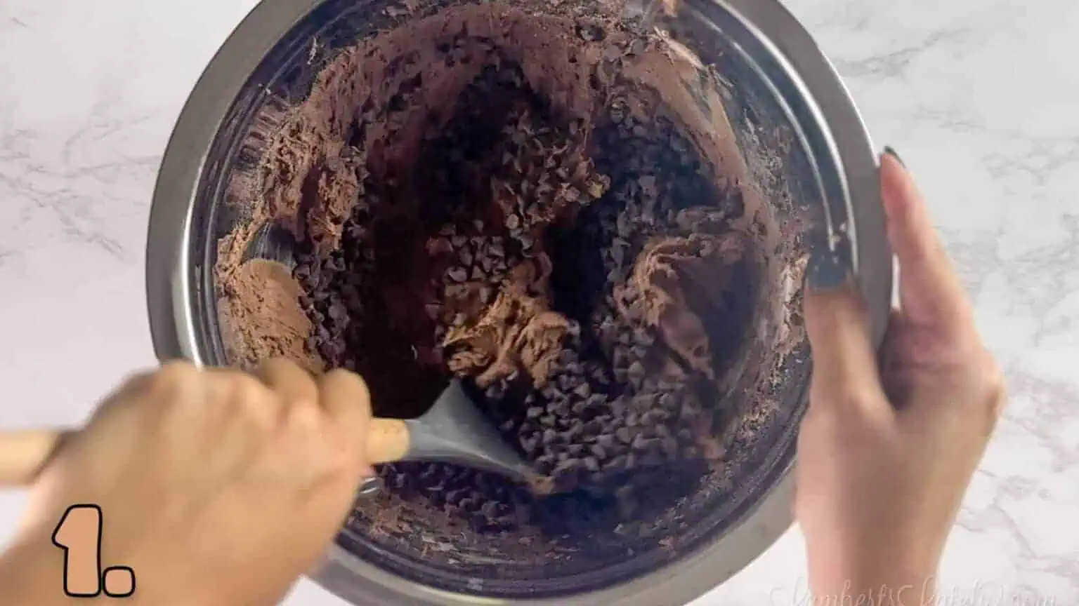 mixing brownie mix cookie dough in a bowl.