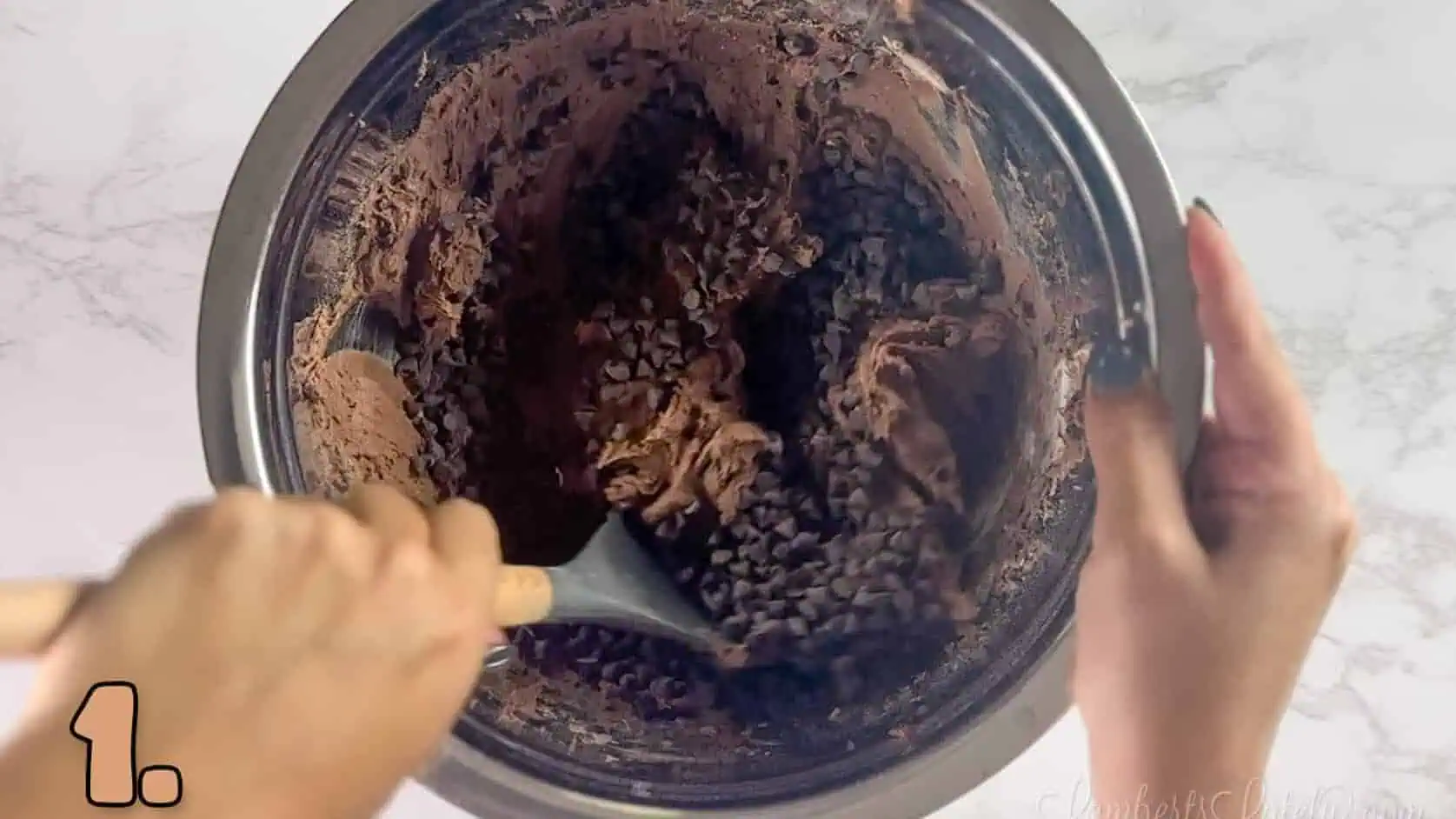 mixing brownie mix cookie dough in a bowl.