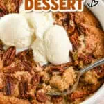 Delicious butter pecan dessert with ice cream and pecans in a white bowl.