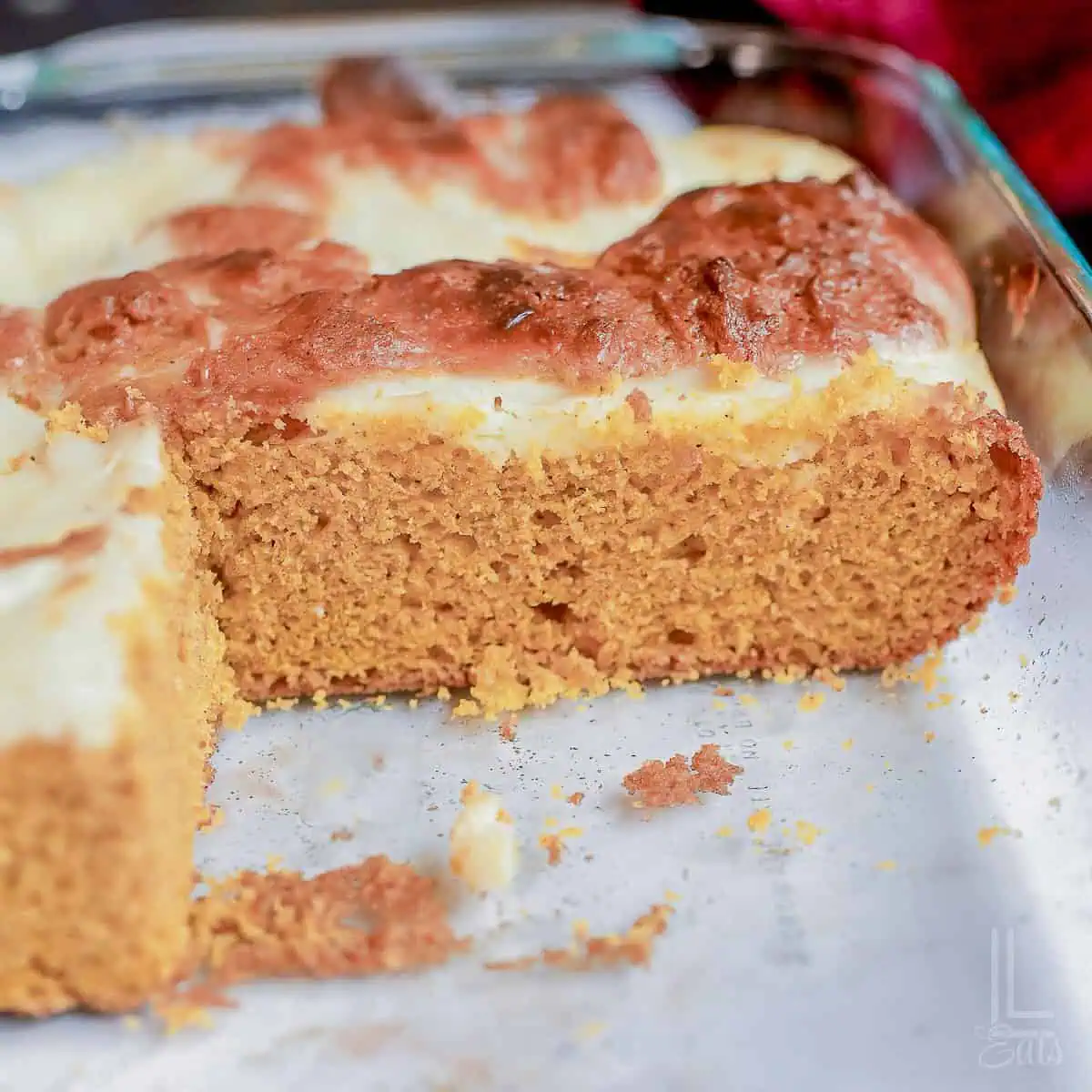 looking into a pan of cut pumpkin bars.