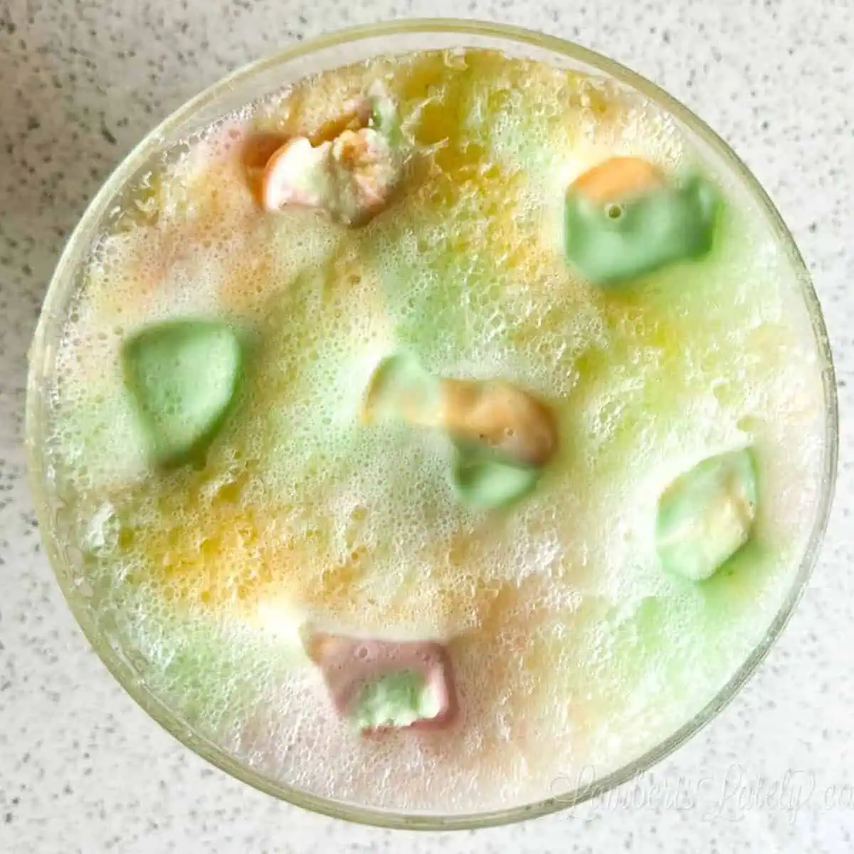 rainbow sherbet added to a punch bowl.